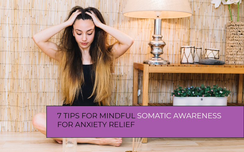 Girl practicing mindful somatic awareness breathing exercise on a yoga mat to support anxiety relief